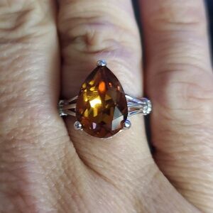 STERLING SWAROVSKI SILVER WITH AMBER COLORED STONE SZ 8